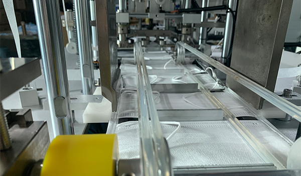 一拖一內(nèi)耳包邊口罩機(jī)